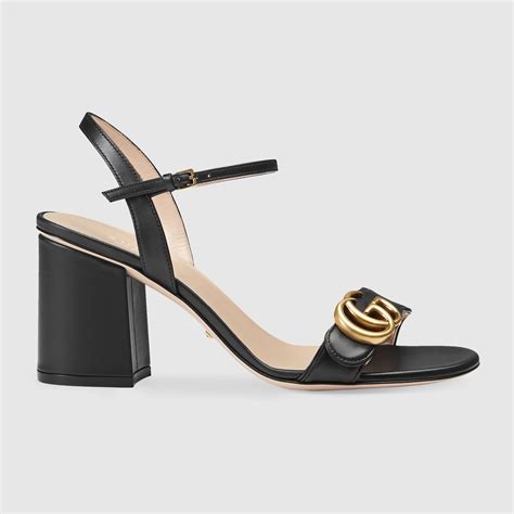 black Gucci heeled sandals